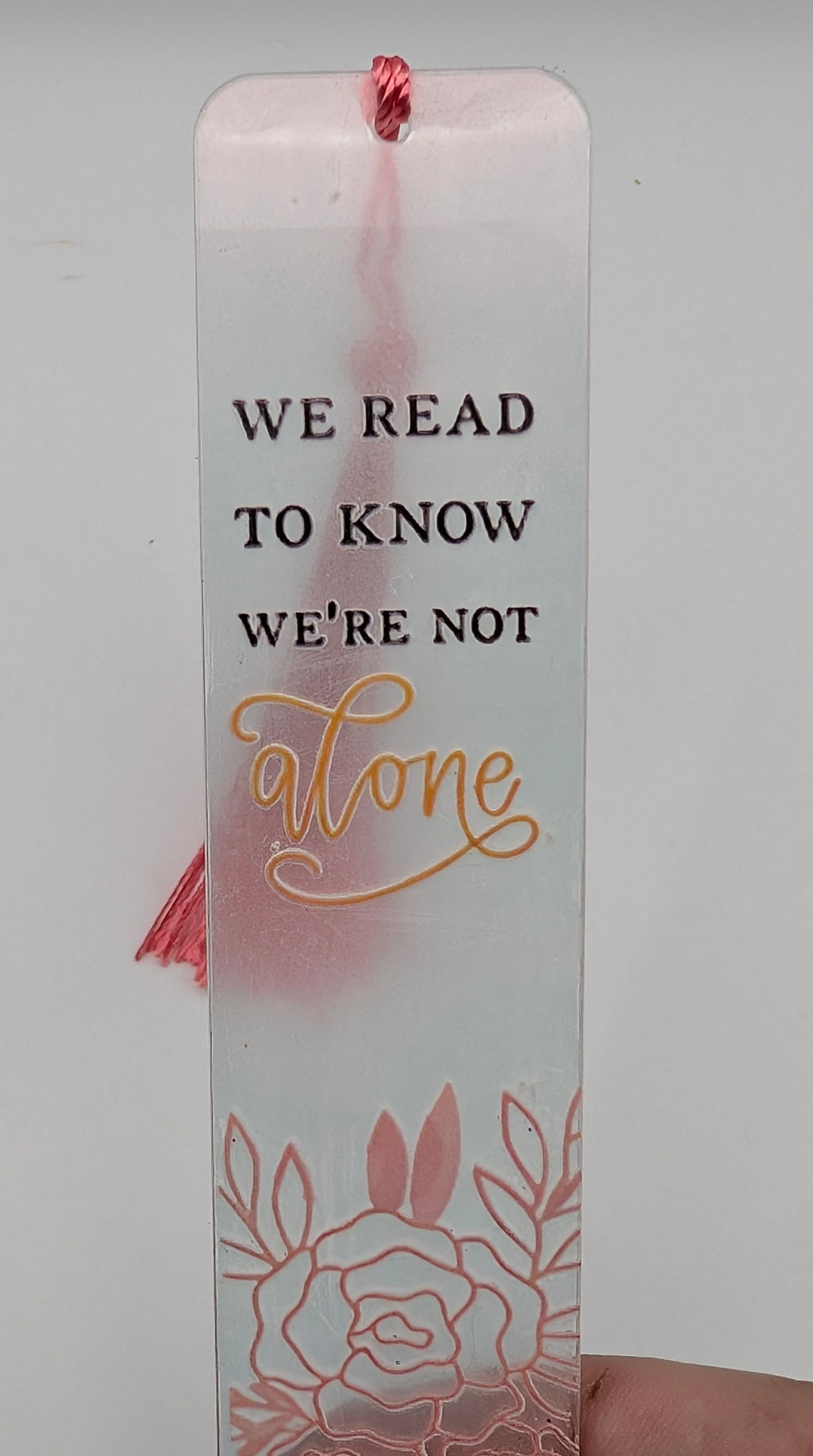 "We Read to Know We're Not Alone" Color Shift Floral Bookmark