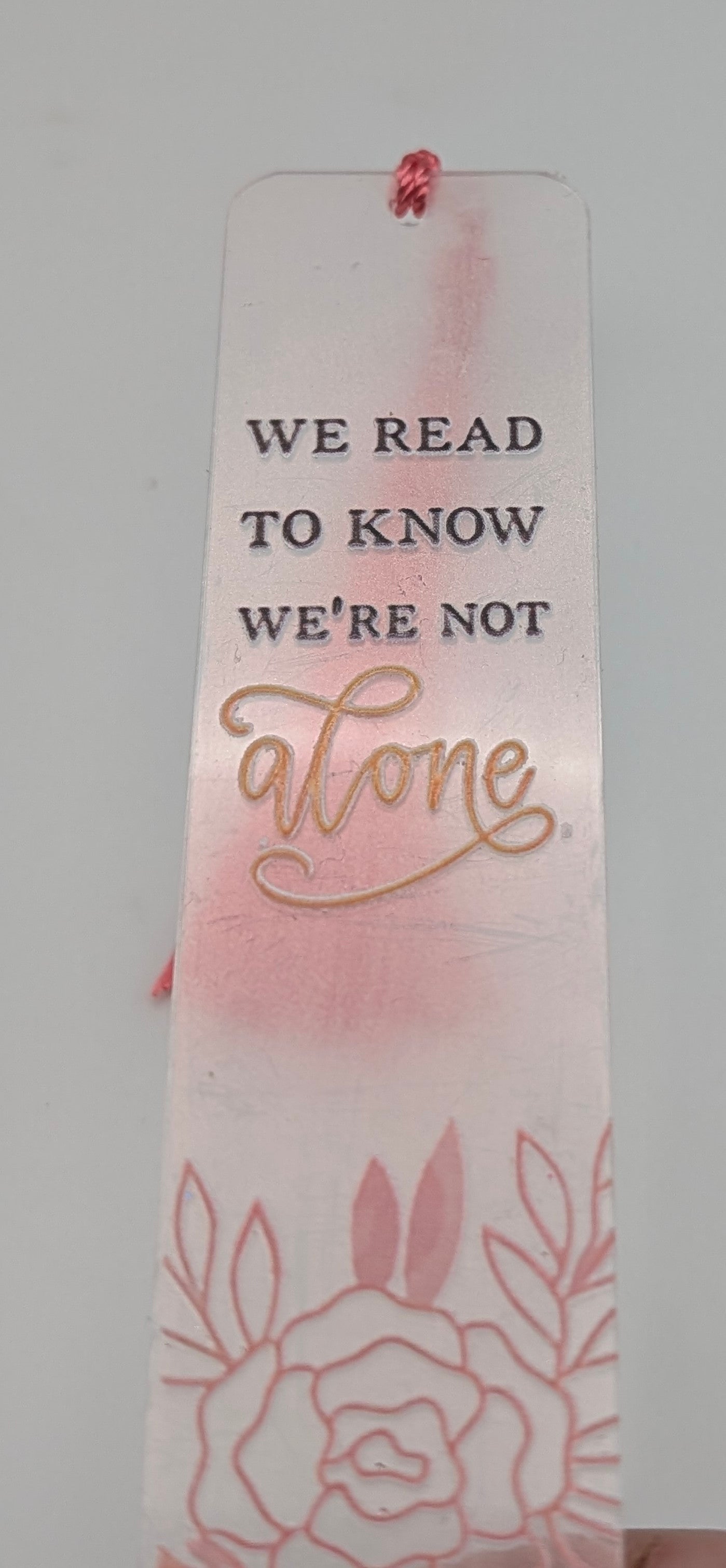 "We Read to Know We're Not Alone" Color Shift Floral Bookmark