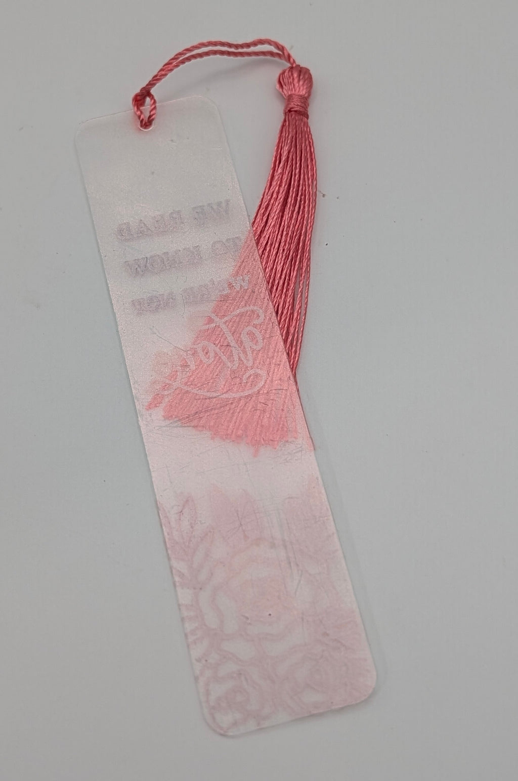 "We Read to Know We're Not Alone" Color Shift Floral Bookmark
